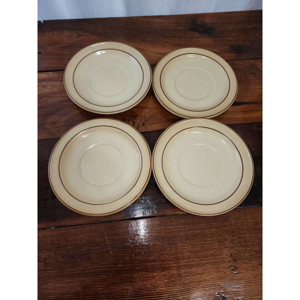 Pfaltzgraff Village set of four small saucers